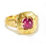 A circa 1900 yellow metal star ruby ring, the ruby weight approx 1.25ct, size I, approx 5.1g.