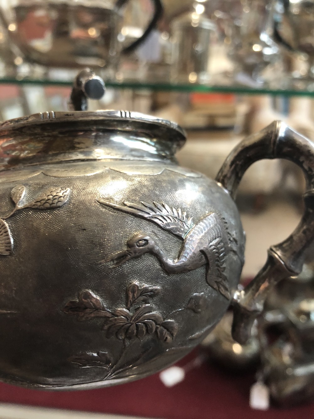 ZEE WO; a circa 1900 Chinese Export silver four piece tea service, all with repoussé decoration of - Bild 6 aus 6