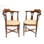 A pair of Edwardian inlaid beech corner chairs (2).