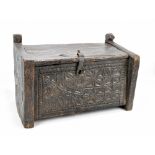 An 18th century and later carved oak and pine chest, length 57cm.