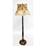 A 20th century standard lamp with chinoiserie decoration, height excluding fitting 150cm.