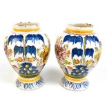 A pair of late 18th century Dutch Delft baluster vases, unmarked, heights 16cm.
