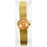 PATEK PHILIPPE; a lady's vintage 18ct yellow gold wristwatch, with circular dial and eighteen