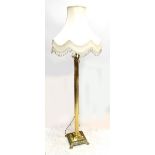 A reproduction brass Corinthian column standard lamp, height excluding fitting 118cm.