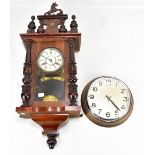 A small reproduction Vienna style wall clock and a German beech framed electric wall clock (2)