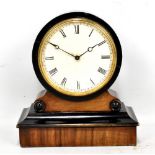 A late 19th century French walnut and ebonised mantel clock, the circular dial with Roman