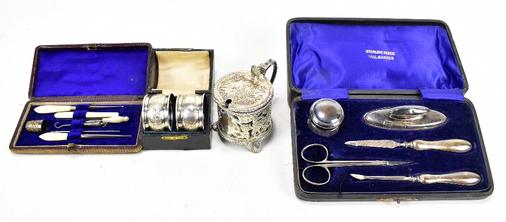 A small group of hallmarked silver to include an Edward VII mustard pot, Birmingham 1902, a silver