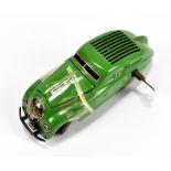 SCHUCO; a green clockwork 'Commando Anno 2000' car, length 14cm (af).