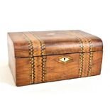 A 20th century walnut inlaid work box with mother of pearl cartouche.