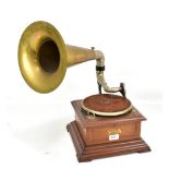 An early 20th century mahogany and inlaid Apollo gramophone with brass horn, width of case 28.5cm.