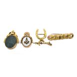 A small group of jewellery comprising two 9ct yellow gold brooches, approx 4.1g, a yellow metal
