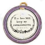 An early 19th century circular plaque inscribed 'If ye love MEE, keep my commandments', diameter