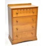 An early 20th century oak chest of four long drawers raised on plinth base, width 78cm.