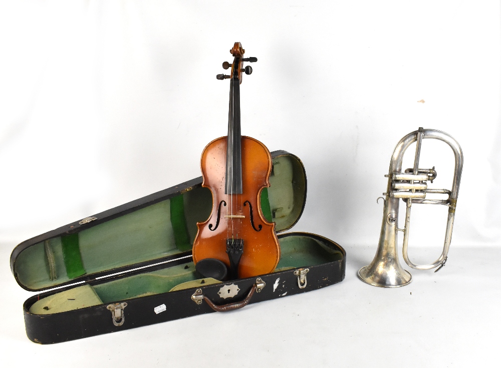 A cased violin bearing spurious label, length of back 35cm, and a Besson & Co Class A horn (af) (