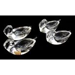 BAYEL; a boxed set of four glass salts modelled as swans with original spoons, one salt retaining