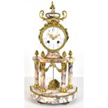 A late 19th century French gilt metal and marble mantel clock, the circular enamel and floral