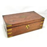 An early 19th century mahogany and brass bound campaign writing slope with 'secret' side drawer,