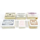 Six Victorian ceramic rectangular toothpaste jars and covers with varied transferred detail (6).