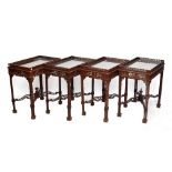 Four reproduction Chippendale style rectangular tables with pierced gallery tops on bamboo form