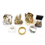 A quantity of costume jewellery including earrings, bracelets, bangle, brooches, fob, etc.