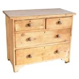 An old pine chest of two short and two long drawers, width 90cm.