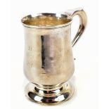 DOROTHY LANGLANDS; a Georgian hallmarked silver mug of baluster form with engraved initials D,H,S,