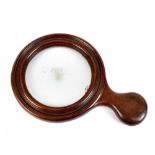 A 19th century mahogany gallery spyglass or picture viewing glass, length 24cm.Additional
