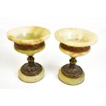 A pair of early 20th century pale green onyx and gilt metal mounted cassolettes, height 13cm.