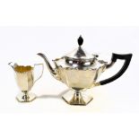 WILLIAM HUTTON & SONS LTD; a George V hallmarked silver teapot, inscribed to base 'To R.W. Evans