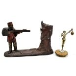 CREEDMOOR; a cast metal novelty money bank in the form of a soldier with rifle shooting a tree,