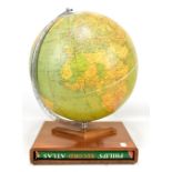 PHILIPS; a  circa 1960 'Challenge' globe on teak plinth base enclosing Philips Record Atlas book,