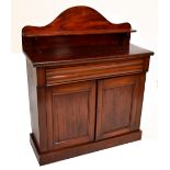 A Victorian mahogany chiffonier with single drawer above twin cupboard doors enclosing single shelf,