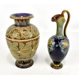 DOULTON LAMBETH; a floral decorated stoneware ovoid vase, impressed marks to base and dated 1879,