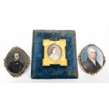 A 19th century portrait miniature depicting a young lady wearing a necklace and a light blue