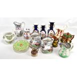 A quantity of decorative ceramics including vases and jugs.