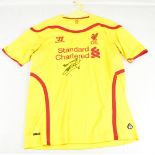 STEVEN GERRARD; a signed replica Liverpool away shirt.