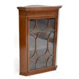 A 19th century mahogany and inlaid flat fronted corner cupboard with astragal glazed door, height