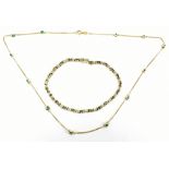 A 14ct yellow gold and emerald necklace, length approx 42cm, approx 4.6g, also a 9ct yellow gold