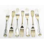 Seven various 19th century hallmarked silver Fiddle pattern small forks, various hallmarks, combined