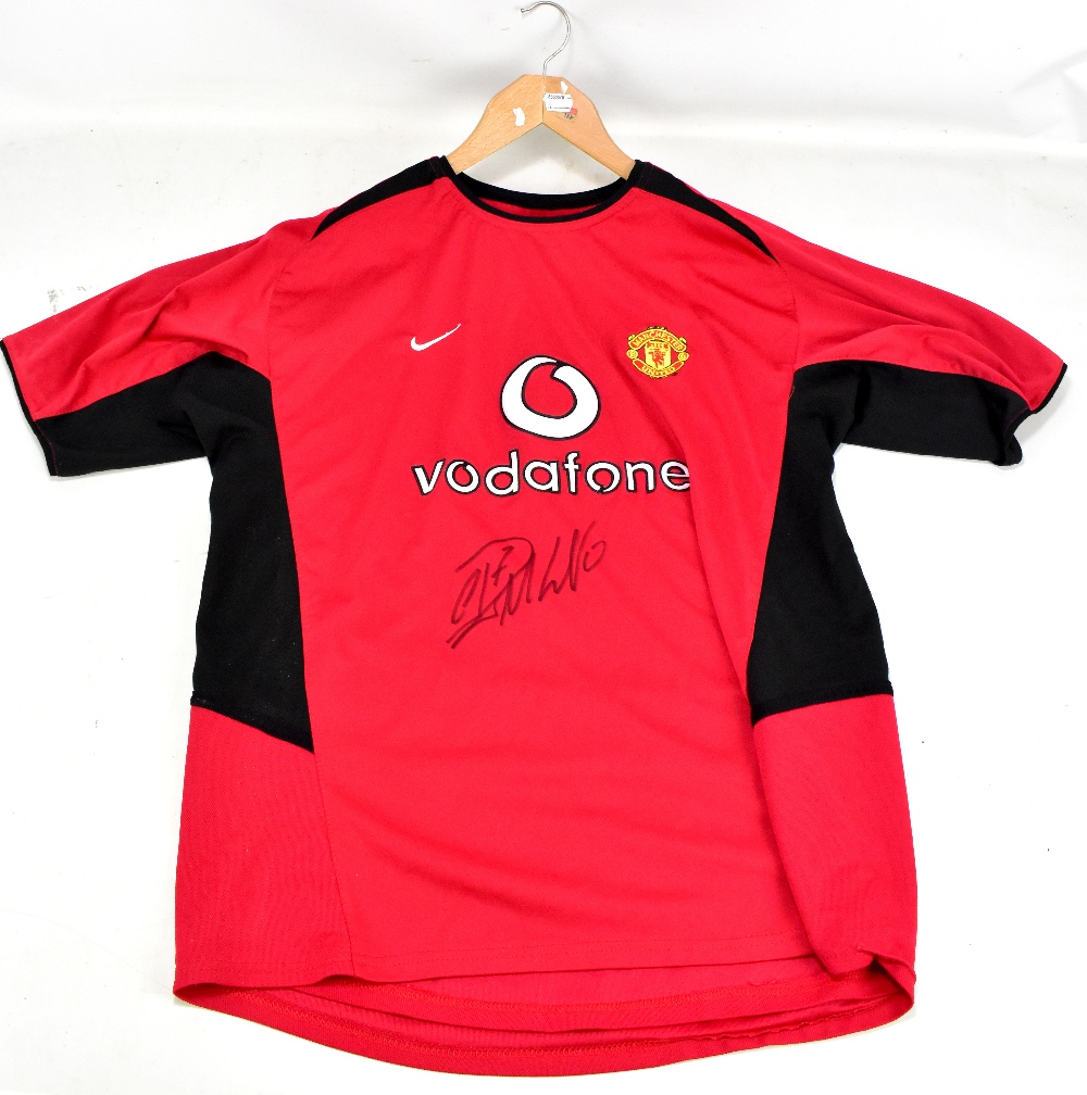 CRISTIANO RONALDO; a signed replica Manchester United 2003 shirt.Additional InformationUnable to