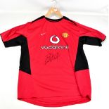 CRISTIANO RONALDO; a signed replica Manchester United 2003 shirt.Additional InformationUnable to