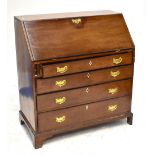 A Georgian mahogany bureau, the fall-front enclosing four small drawers above four long drawers,