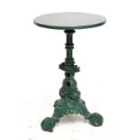 An early 20th century green painted cast iron garden table, with later wooden top, diameter 44cm.