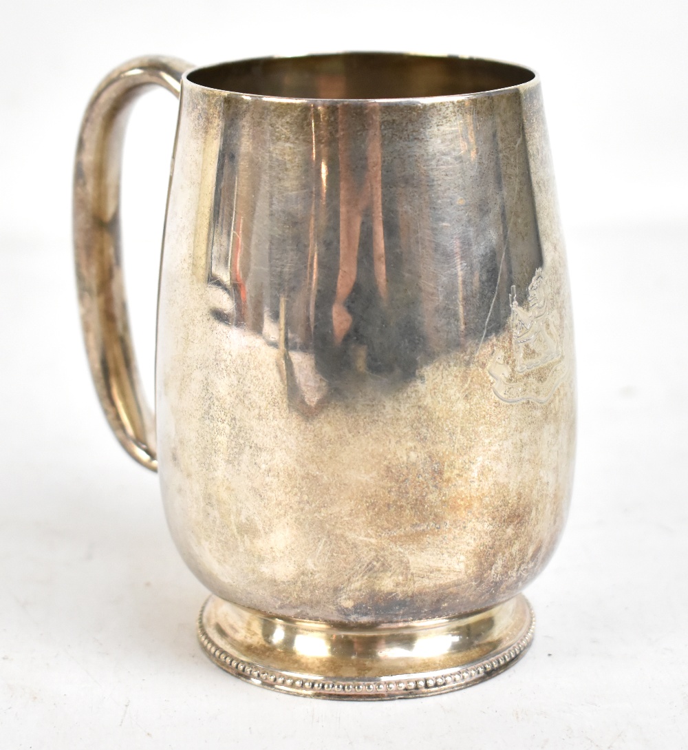 RICHARDS & BROWN; a Victorian hallmarked silver mug, with inscribed armorial crest, height 12cm,