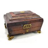 A 19th century leather bound sewing box with gilt metal mounts and handles featuring burr walnut