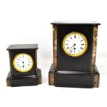 Two Victorian marble and slate mantel clocks, each with circular enamel dials with Roman numerals,
