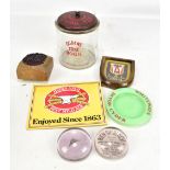 A small group of advertising memorabilia including 'Ogden's Toke Bogie' lidded glass jar,