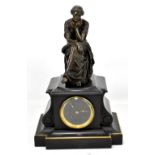 A 19th century black slate mantel clock, the circular dial set with gilt Roman numerals (part worn),