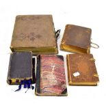 Three Victorian photograph albums, predominantly portraiture, a cased bible and a blank album (5).