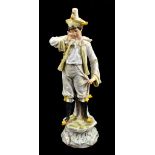 MEISSEN; a 19th century figure of a clown, blue painted crossed swords mark to base, also incised